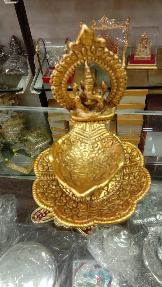 Beautiful Gold Plated Floral Base Hand Shape Diya (Sankranti Collection)