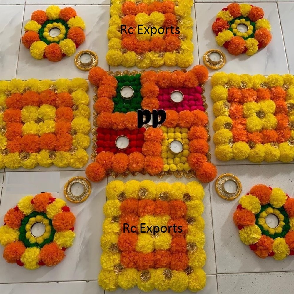 Flowers, Beads And Lace Flower Rangoli Mat With Diya
