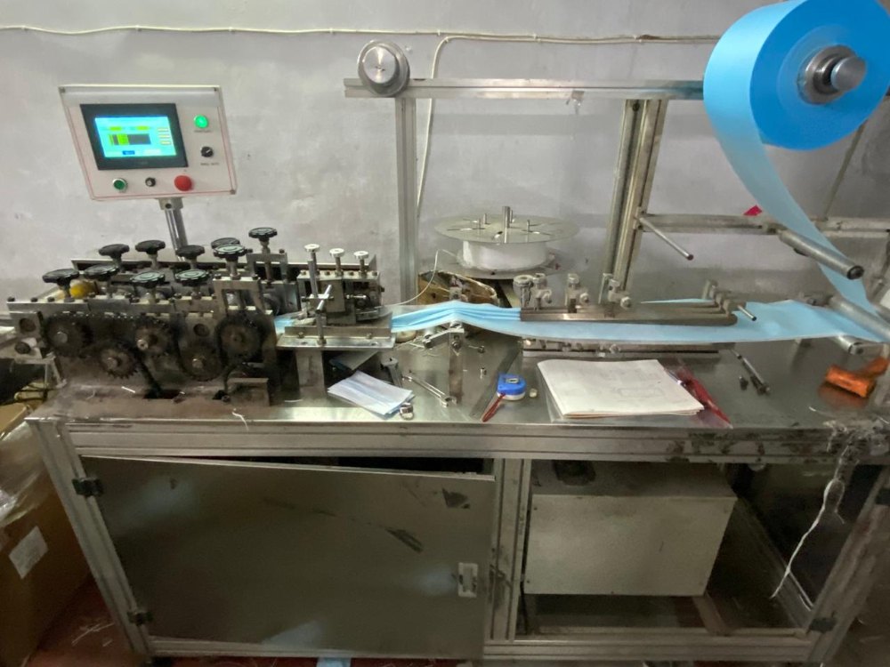 Semi Automatic Surgical Disposable Mask Making Machine, Production Capacity: 60 PPM