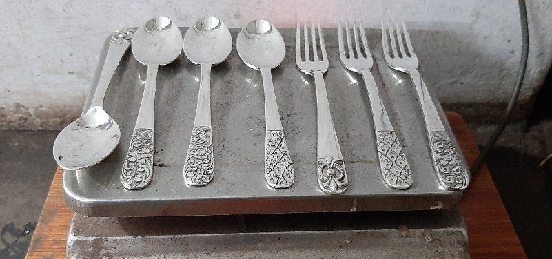 Glossy Silver Antique Spoon
