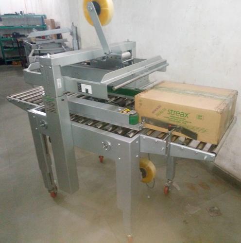 Automatic Box Taping Machine, Capacity: Good, Model: TAPEX