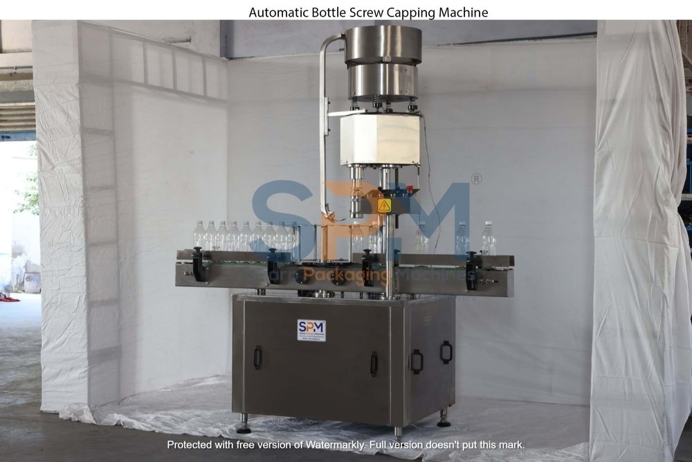 SPM SS Automatic Bottle Screw Capping Machine, 1200 Kg, Model Name/Number: SASCSM-50