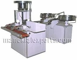 Wad Fixing (Wadding) Machine