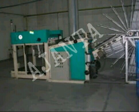 sheet unloader and stacker