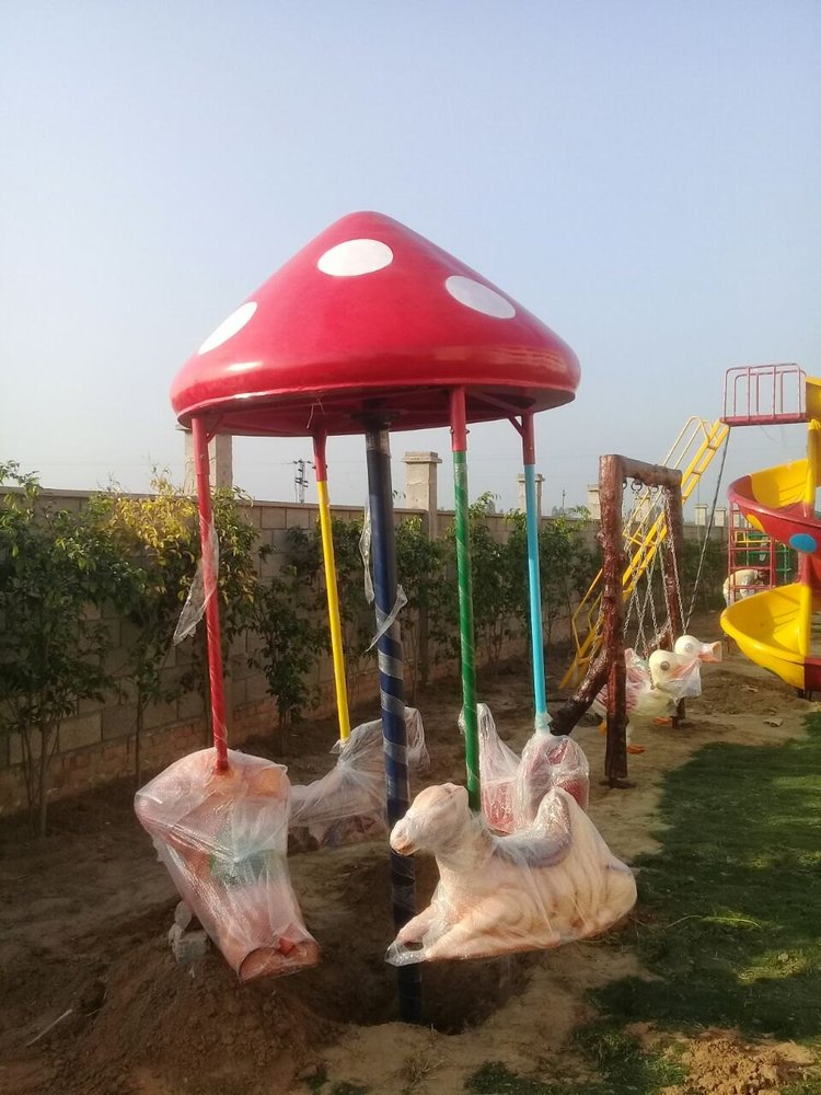Iron and Fiberglass Merry Go Round
