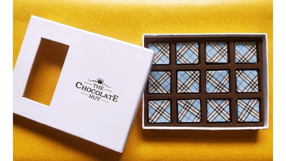 Handmade Milk chocolates with different flavours .