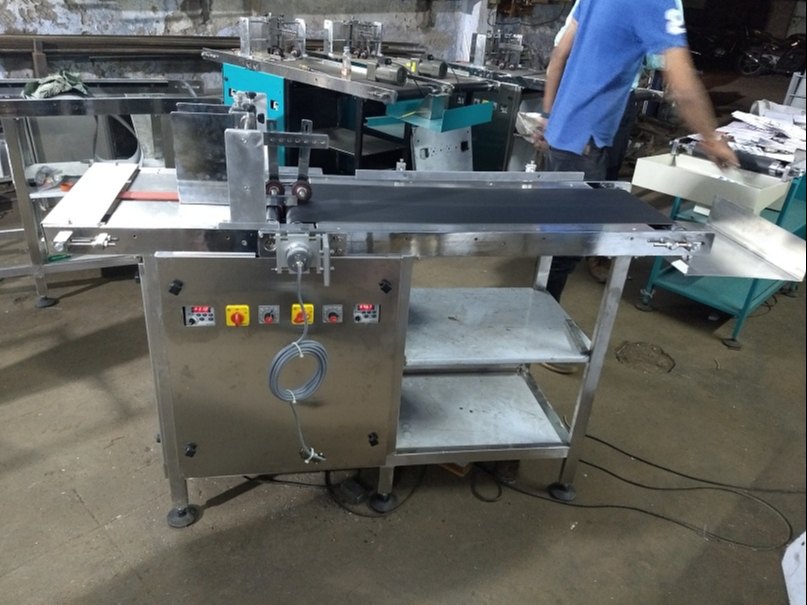 Ramatech Machinery Single Phase Supply Friction Feeder Machine, For Batch Coding Purpose, 150 Pouch Per Minute