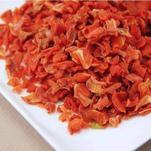 Dried Carrot cubes or flakes.