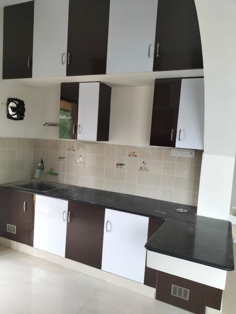 White And Brown L Shape Wooden Kitchen Cupboard