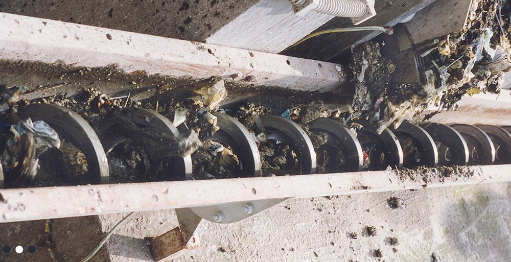 Techno Motion Stainless Steel Sludge Screw Conveyor, Capacity: 100 to 5000 kg