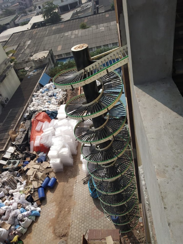 Steel Electric Spiral Gravity Conveyor System, Capacity: 70 Kg/Feet