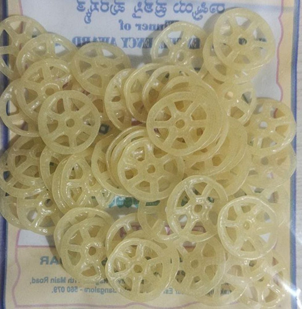 Wheat Wheel Shaped Raw Fryum, Packaging Type: Packet