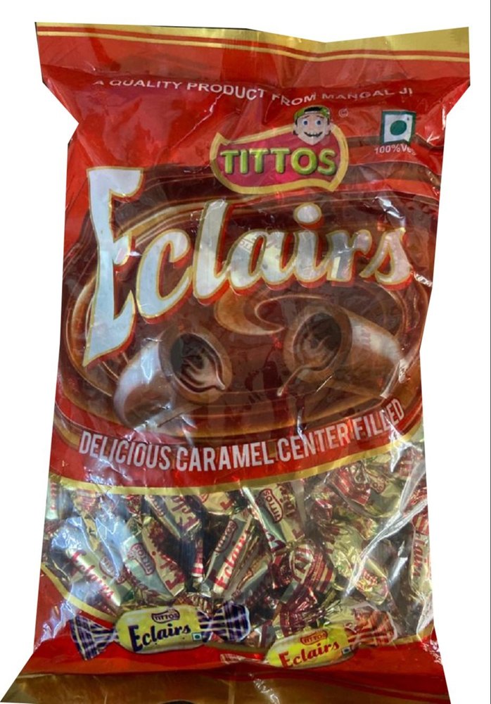 Brown Cylindrical Tittos Eclairs Caramel Center Filled Candy, Packaging Type: Packet, Packaging Size: 100 Toffee